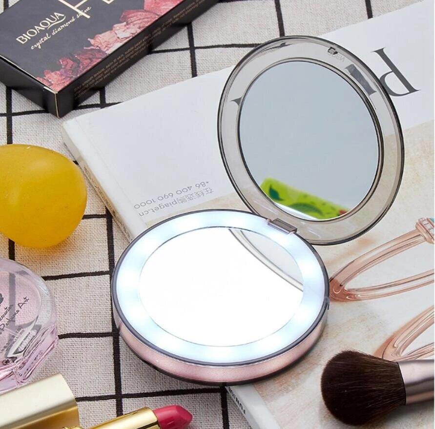 Фото 3 Карманное зеркало для макияжа с LED подсветкой UFT CM2 8.5 х1.75 см