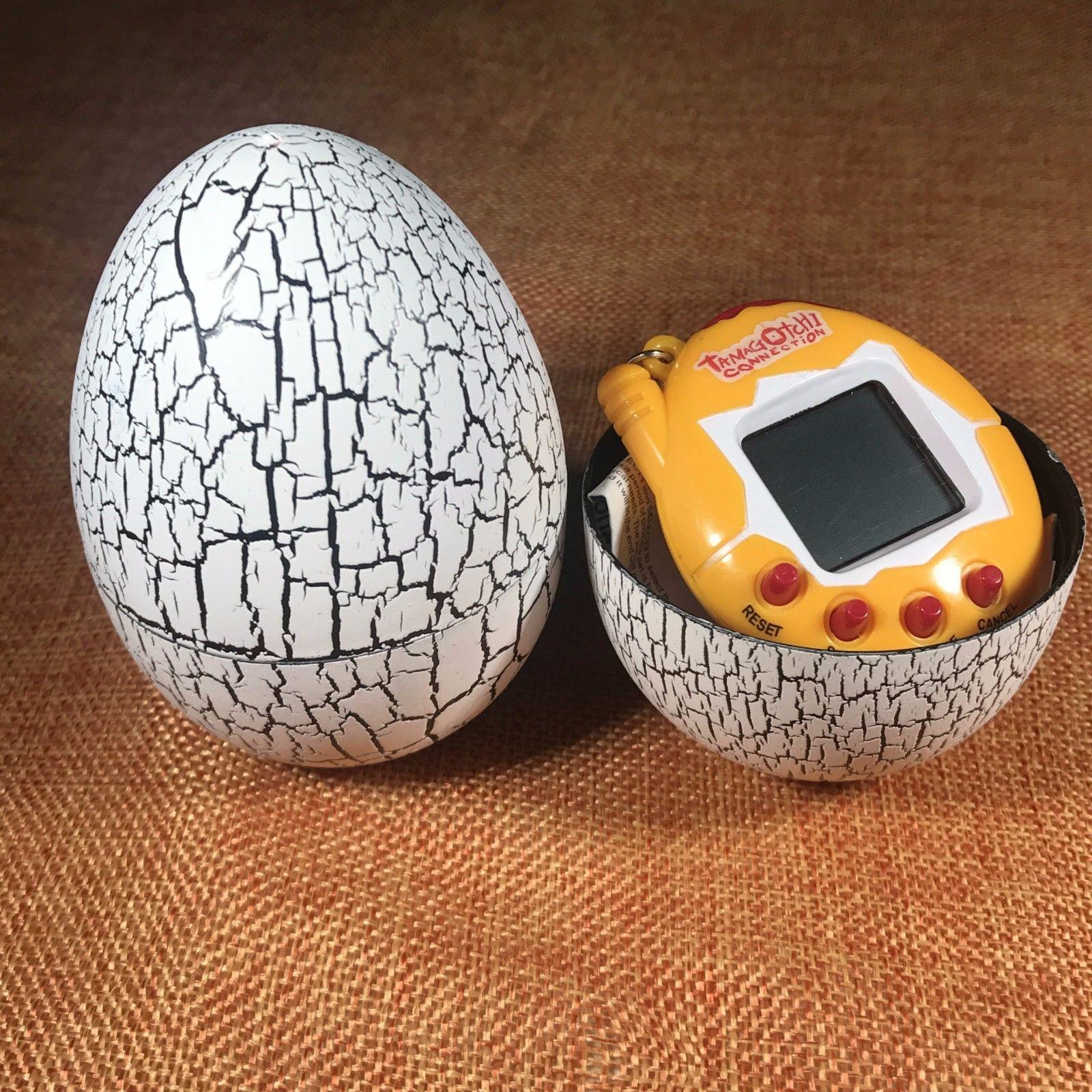 Фото 3 Игрушка электронный питомец Тамагочи в Яйце Динозавра Eggshell Game White